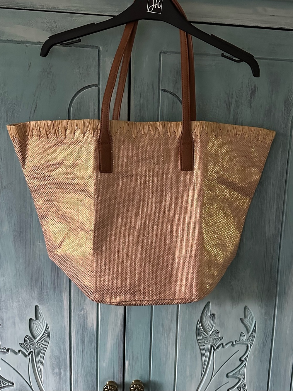 Metallic Rose Gold Tote Bag with Brown Handles/zippered pocket magnet close. $25